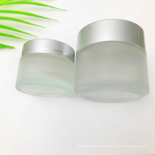 Wholesale Frosted 50ml 100ml Glass Cream Jars For Facial Cream Eye Cream Skin Care Cosmetic Packing Jars With Silver Lid